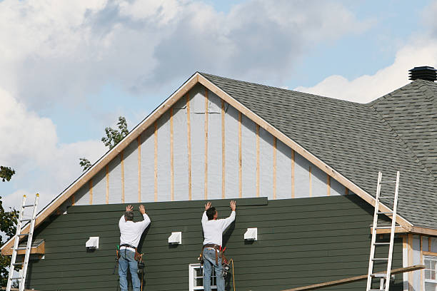 Professional Siding Installation technician working in West Islip, NY
